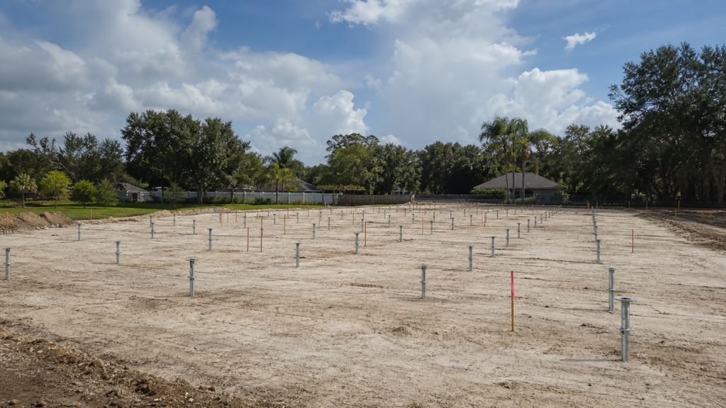 Pre-construction pier layout on an Apopka building pad